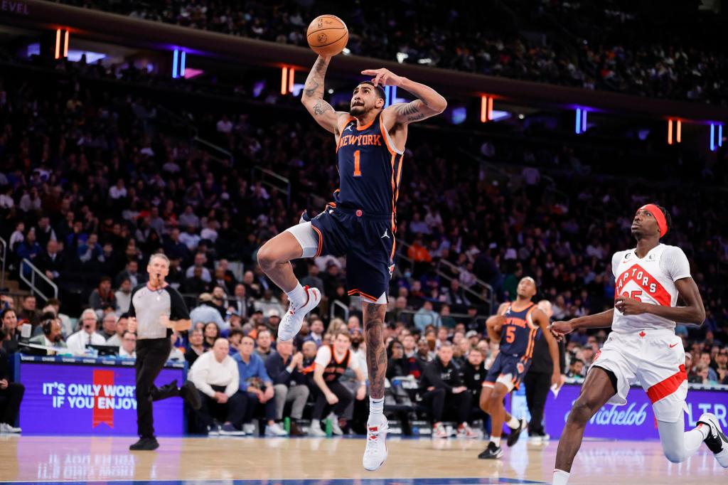 New York Knicks forward Obi Toppin goes up to slam the ball in the first half at the Madison Square Garden in New York, New York, Monday, January 16, 2023.