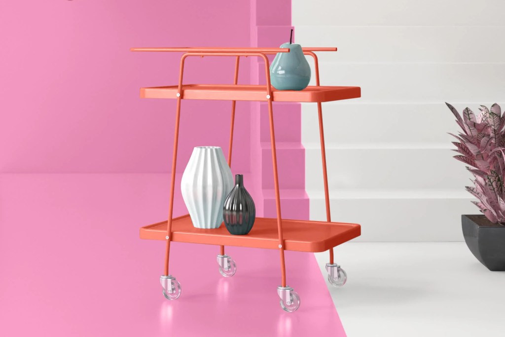 pink bar cart with clear wheels