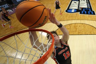 Caden Pierce slams home a dunk during Princeton's 78-63 win over Missouri in the second round of the NCAA Tournament.