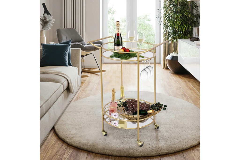 round gold and glass bar cart