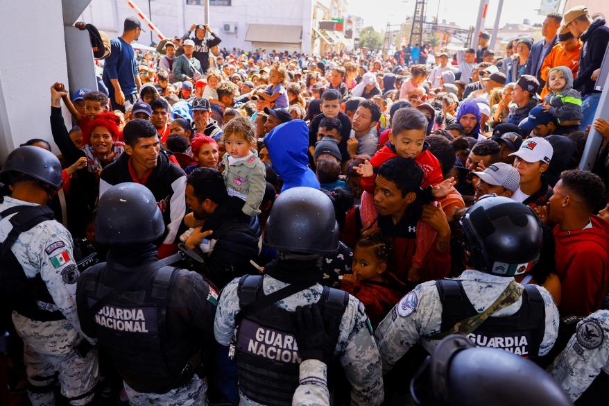 were met with barbed wire, barriers and shields, which prevented them from crossing over.