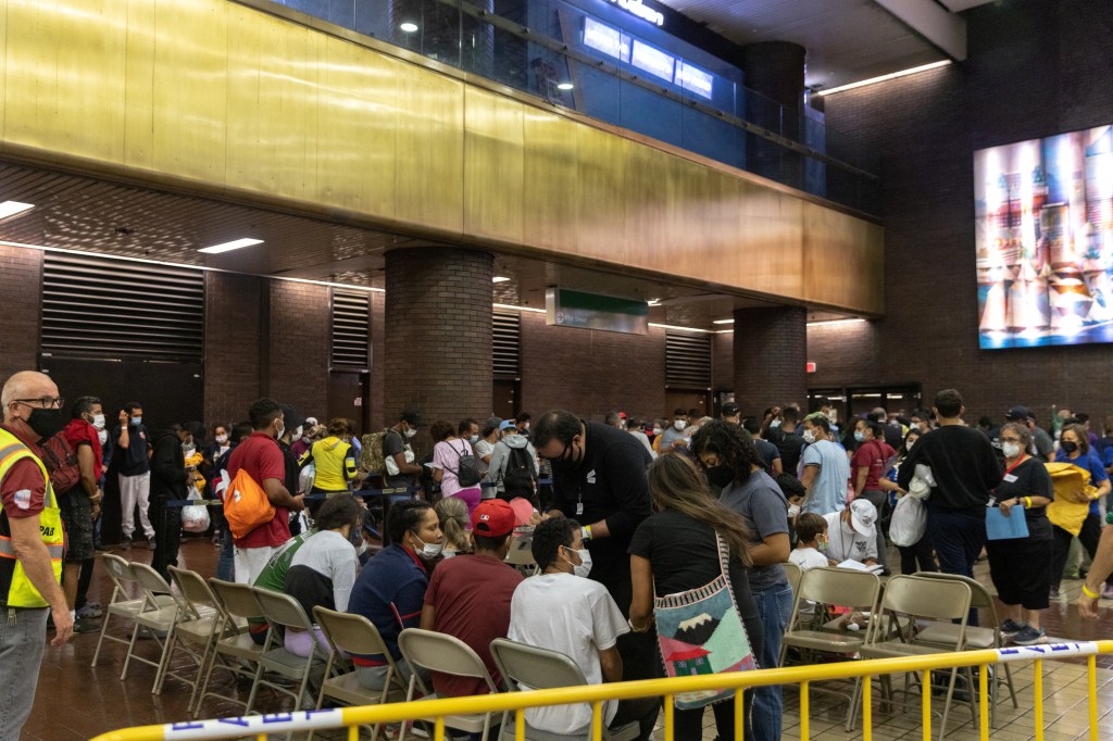 Migrants from Texas arrive at the Port Authority bus terminal in New York, U.S., August 17, 2022. 