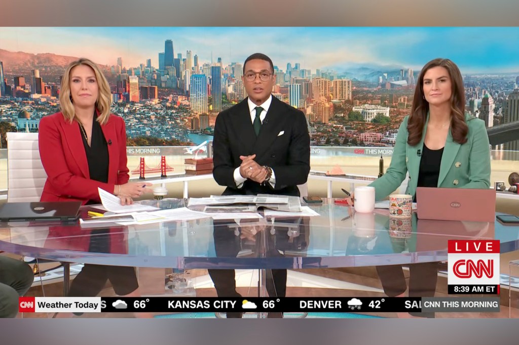 Don Lemon at the anchor desk with Poppy Harlow & Kaitlan Collins.