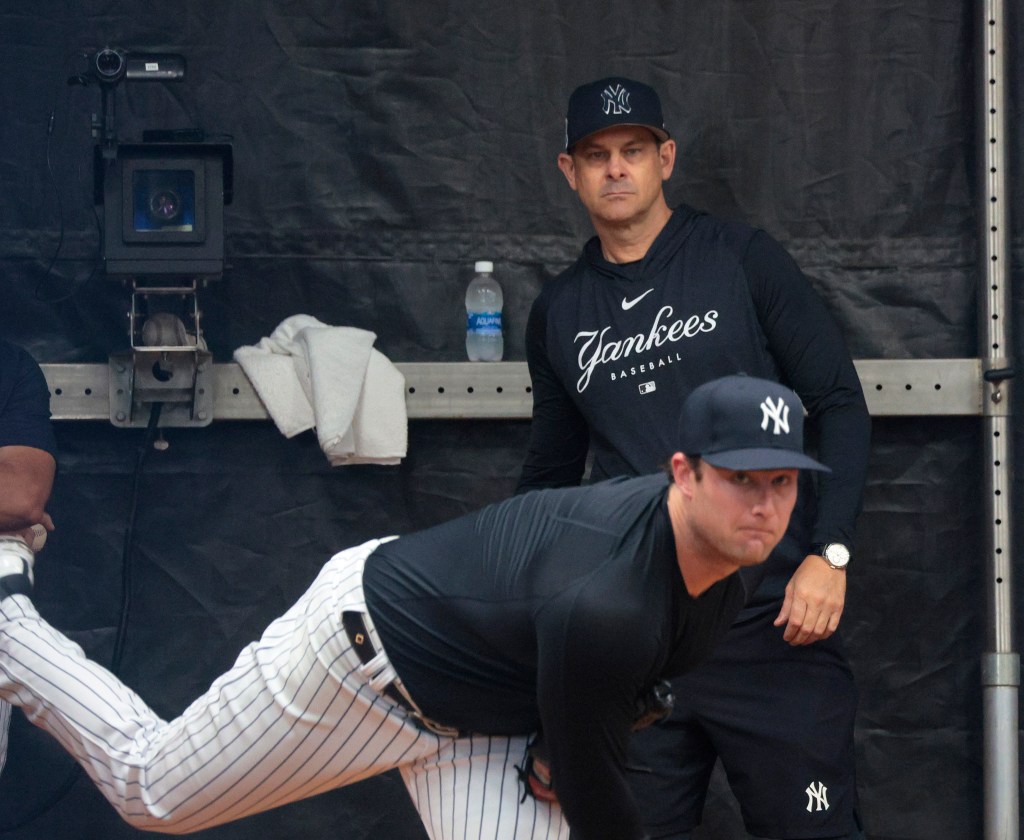 Gerrit Cole watches Gerrit Cole throw a bullpen at Yankees spring training.