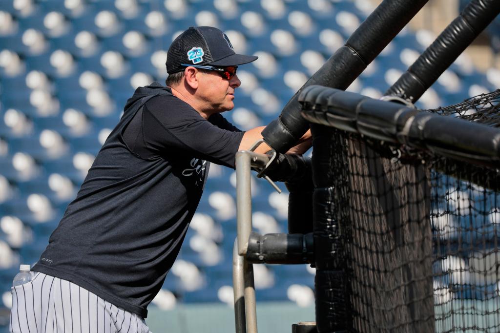 Aaron Boone watches Yankees practice on Feb. 24.