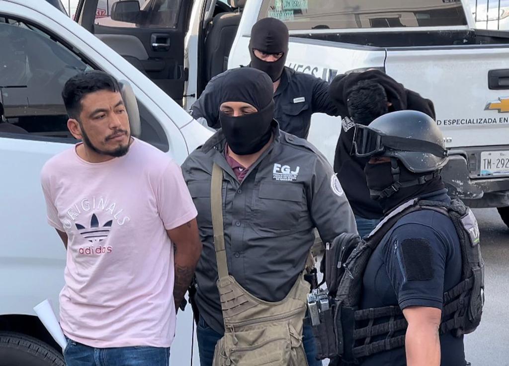 Mexican authorities arresting a man in connection to the kidnapping and deaths of Americans in Mexico.