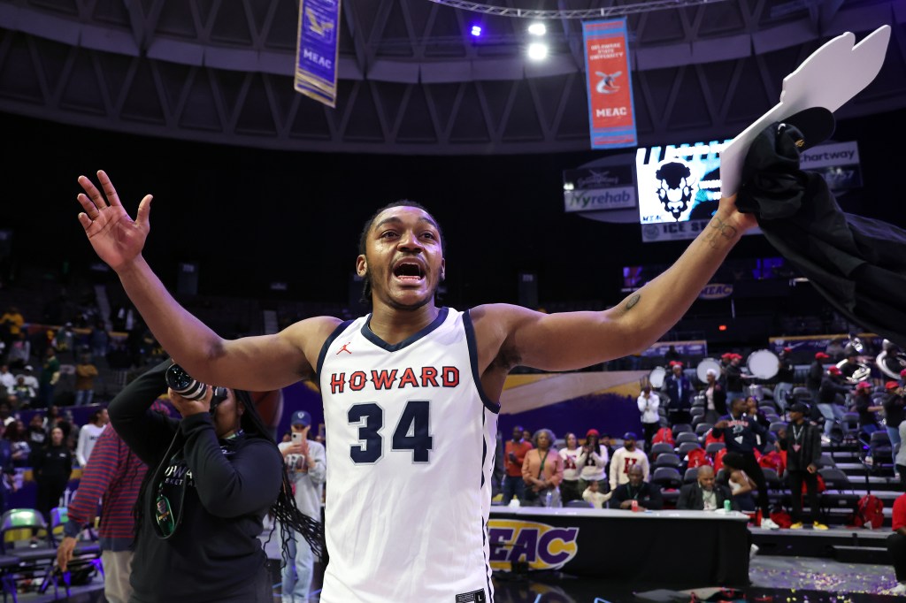 Howard's Bryce Harris celebrates after winning the MEAC Tournament. 