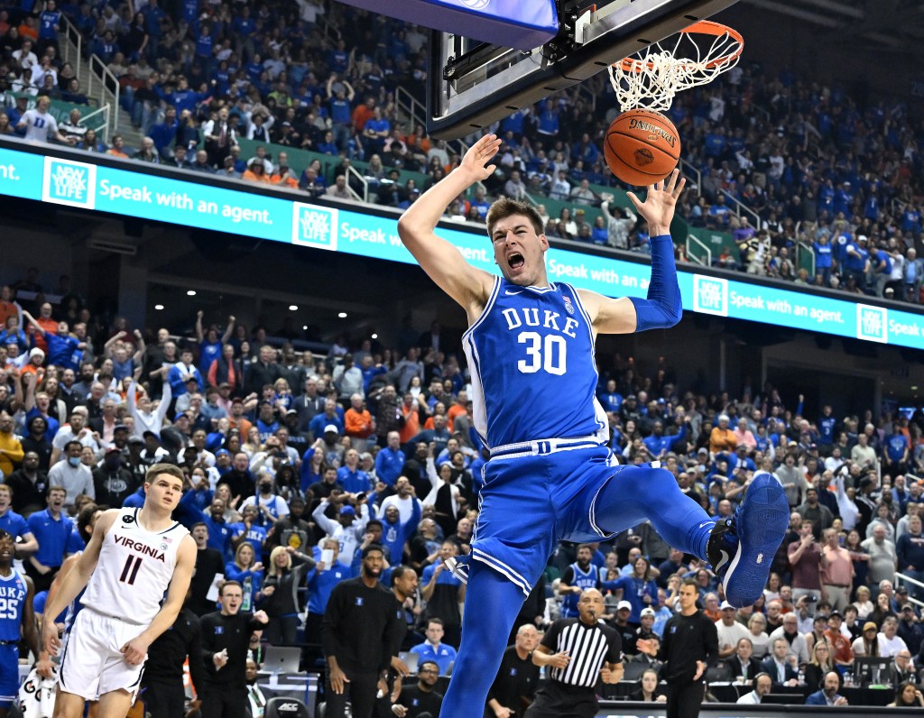 Kyle Filipowski of the Duke Blue Devils reacts after a sunk Virginia Cavaliers in the second half of the ACC Basketball Tournament Championship game.