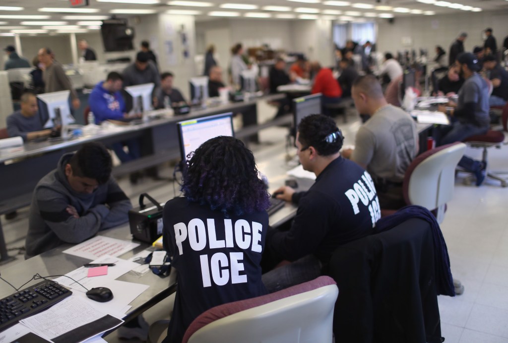 U.S. Immigration and Customs Enforcement (ICE), officers process detained undocumented immigrants on April 11, 2018.
