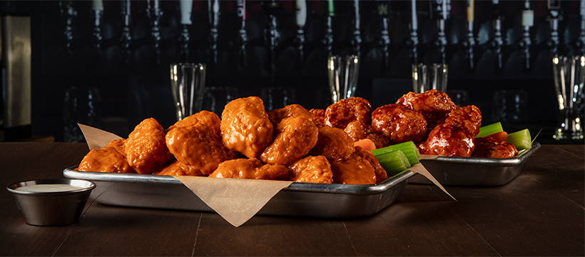 A tray of boneless buffalo wings.