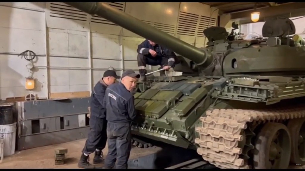 Workers at the 103rd Armored Tank Repair Plant