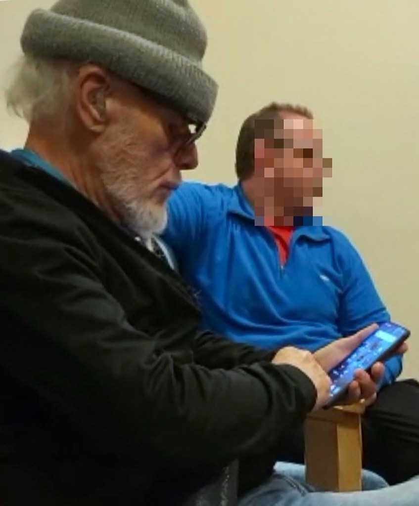 Gary Glitter is seen at a bail hostel for the first time since his release from prison.