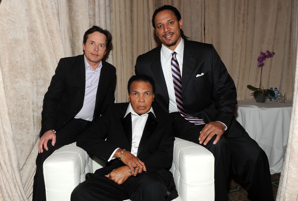 Michael J. Fox (left to right), Muhammad Ali, and Brian Grant together at a benefit for the Michael J. Fox Foundation in 2010.  