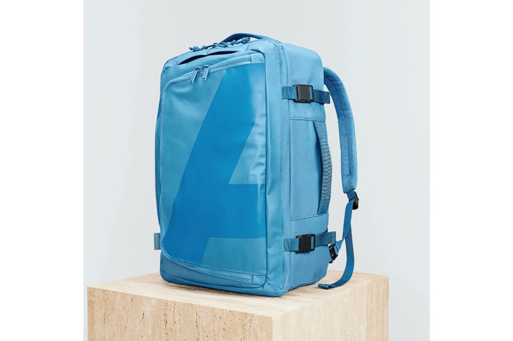 Blue travel backpack with side handles