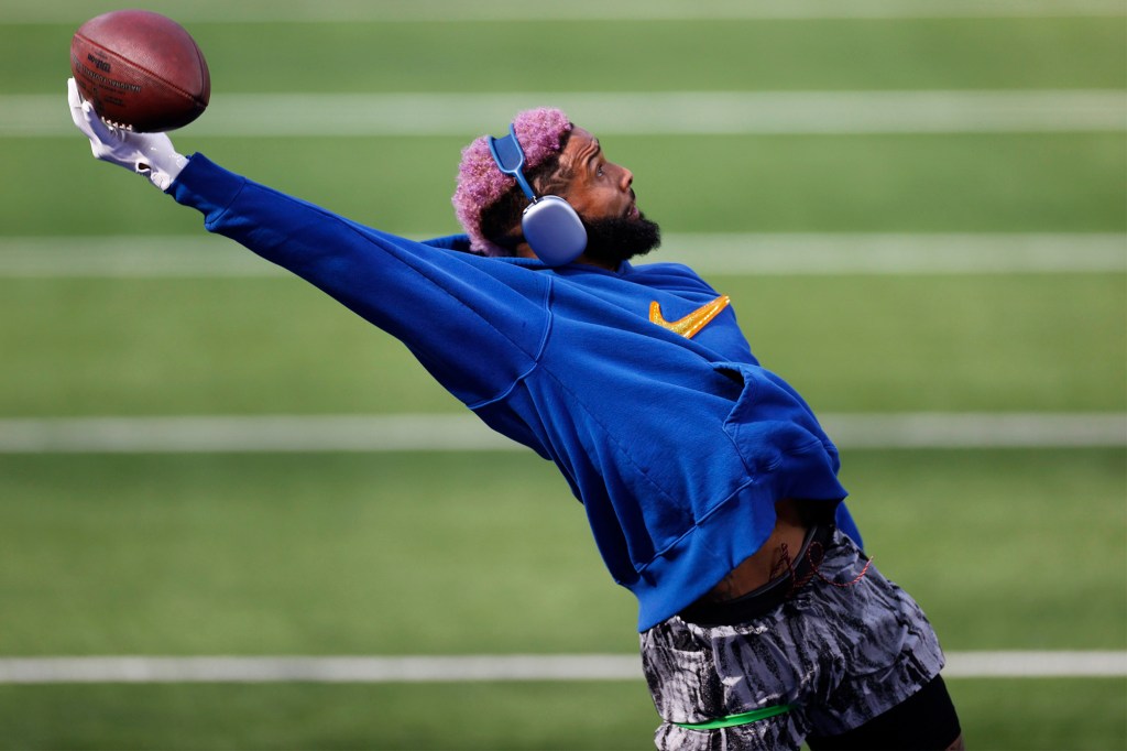 Odell Beckham Jr. makes a one-handed catch while warming up for Super Bowl 2022 in February 2022.