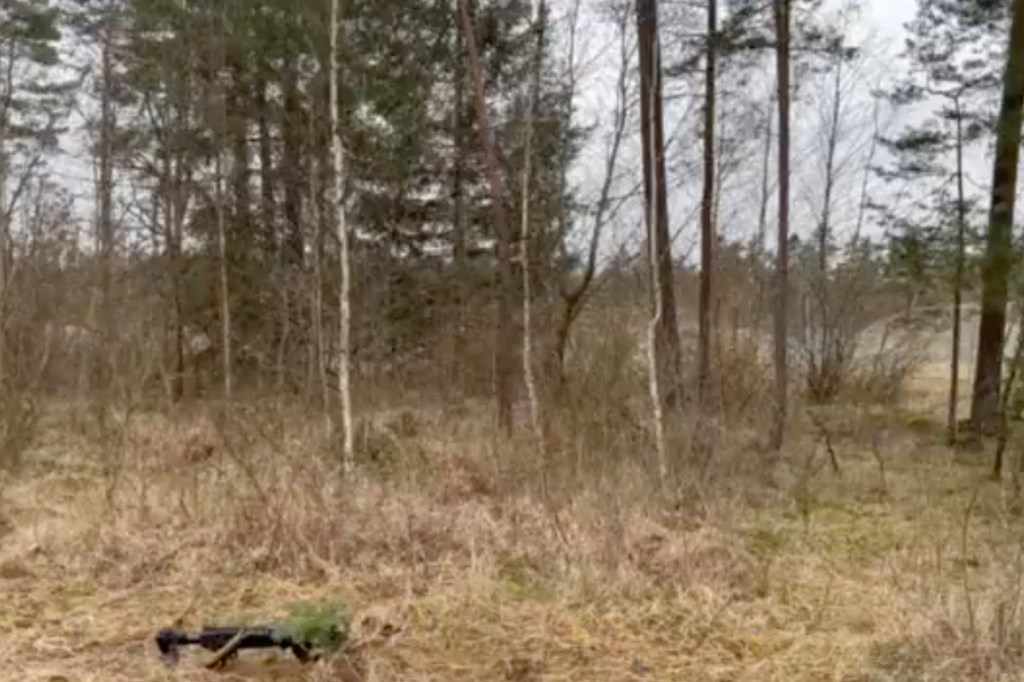 While training abroad, Ukrainian soldiers work on their masking techniques.