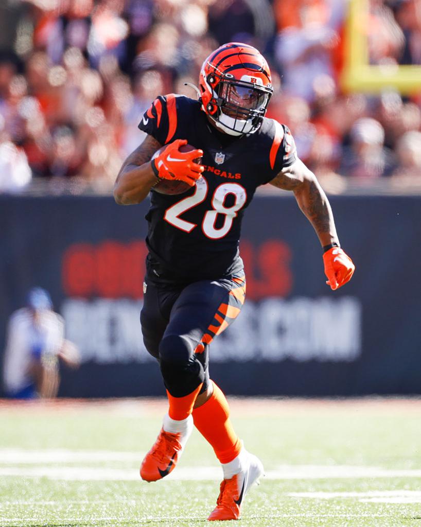 Cincinnati Bengals running back Joe Mixon carries the ball during the game against the Carolina Panthers in 2022.