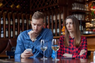 Man texting woman angry