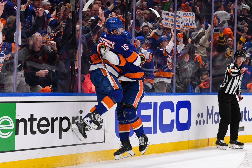 Casey Cizikas (53) celebrates his goal with right wing Cal Clutterbuck (15) during the Islanders' Ga,e 3 win over the Hurricanes on April 21.