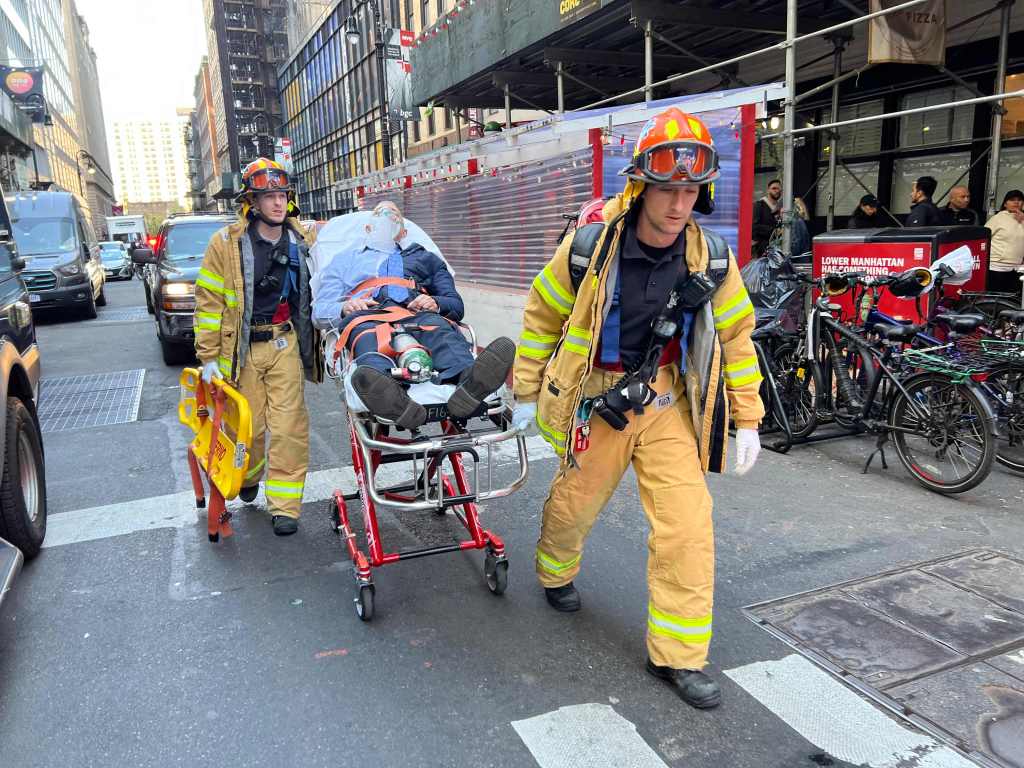 FDNY members on the scene of the collapse.