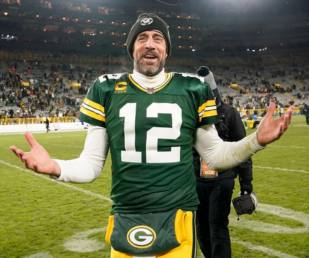 Aaron Rodgers #12 of the Green Bay Packers walks off the field after defeating the Los Angeles Rams at Lambeau Field on Dec. 19, 2022 in Green Bay, Wisconsin.