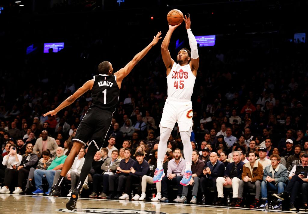 Donovan Mitchell, shooting a jumper over the Nets' Mikal Bridges during a recent game, is one of the Cavaliers' top 3-point shooters.