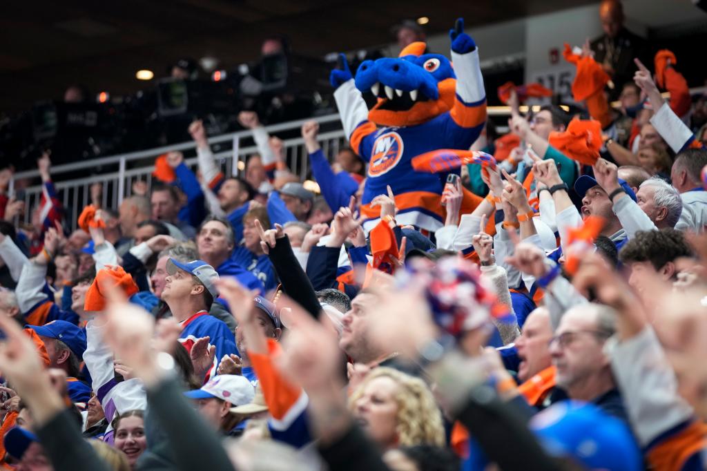 Islanders fans celebrate at UBS Arena during the team's win over the Hurricanes on April 21.