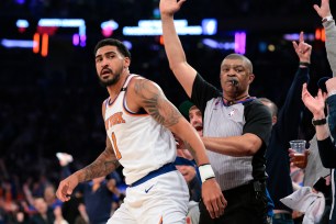 Obi Toppin reacts after making one of his four 3-pointers in Sunday's Game 1 loss to the Heat at the Garden. 