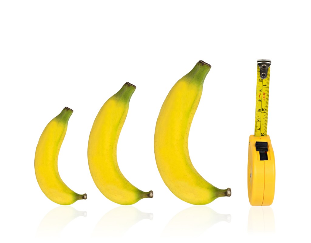A stock image of bananas and measuring tape. 