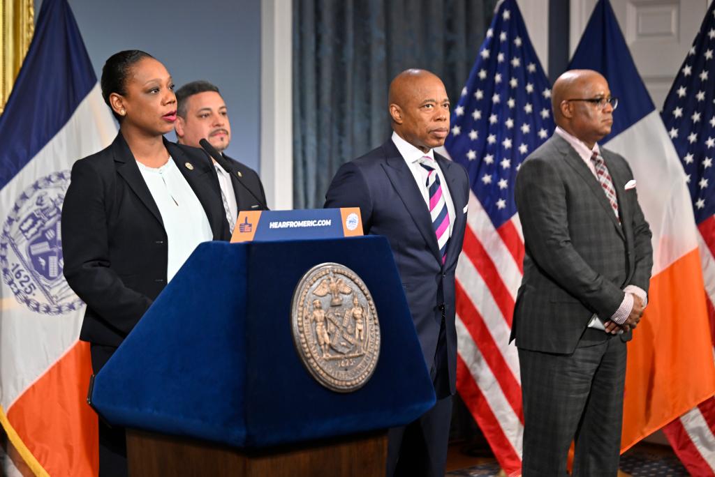 NYPD Commissioner Keechant Sewell speaks at a City Hall ceremony honoring the three heroic officers. She's joined by Mayor Eric Adams, First Deputy Police Commissioner Edward Caban, NYPD Chief of Patrol John Schell and Deputy Mayor for Public Safety Philip Banks III.