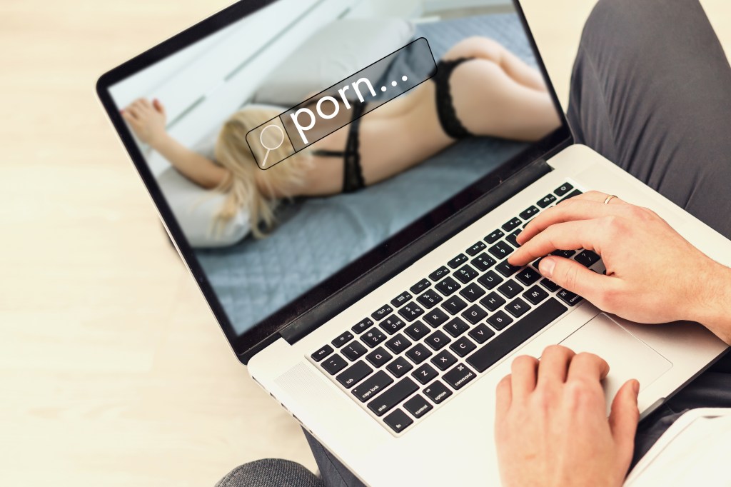 Man watching porn on a laptop