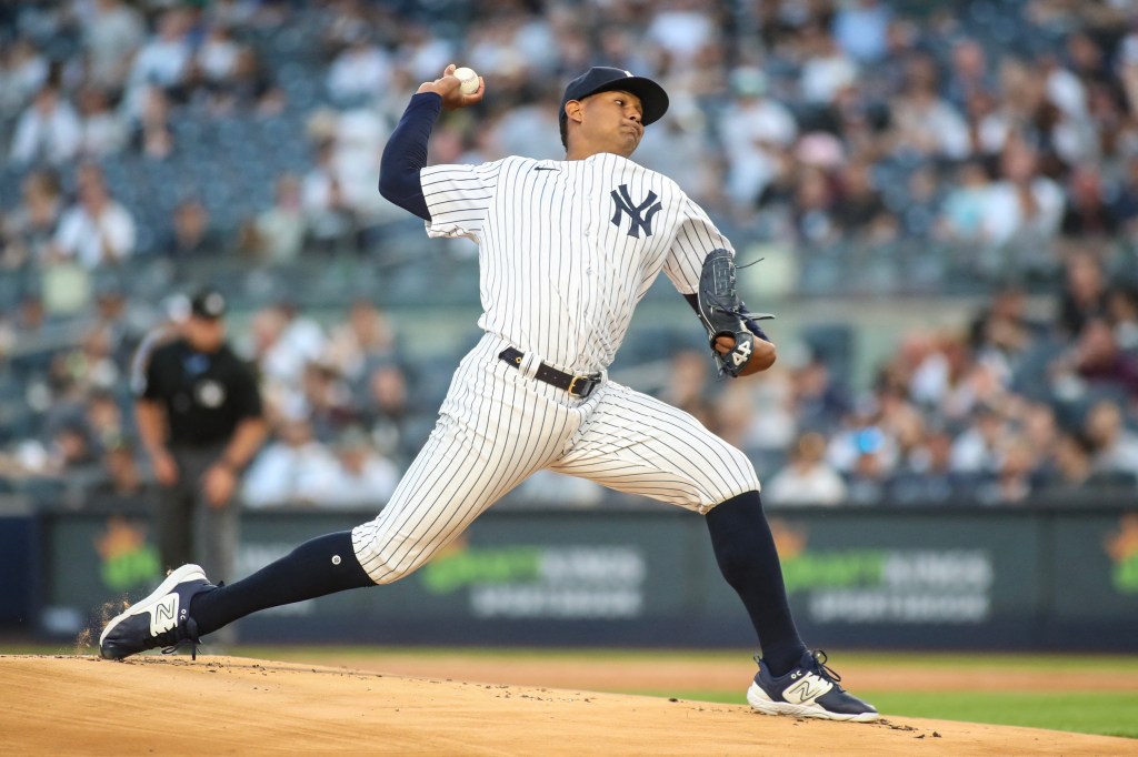 Jhony Brito pitches for the Yankees against the Twins on April 13, 2023.