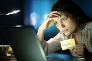 Woman looking anxious about identity theft.