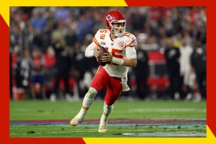 Chiefs quarterback Patrick Mahomes scrambles before throwing a pass.