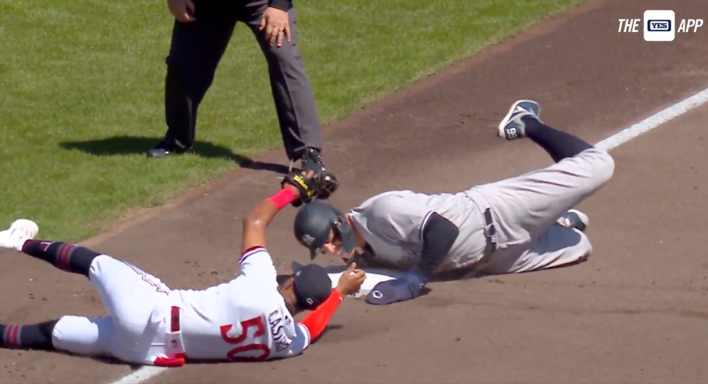 Aaron Judge appeared to jam his hand or wrist sliding into third.