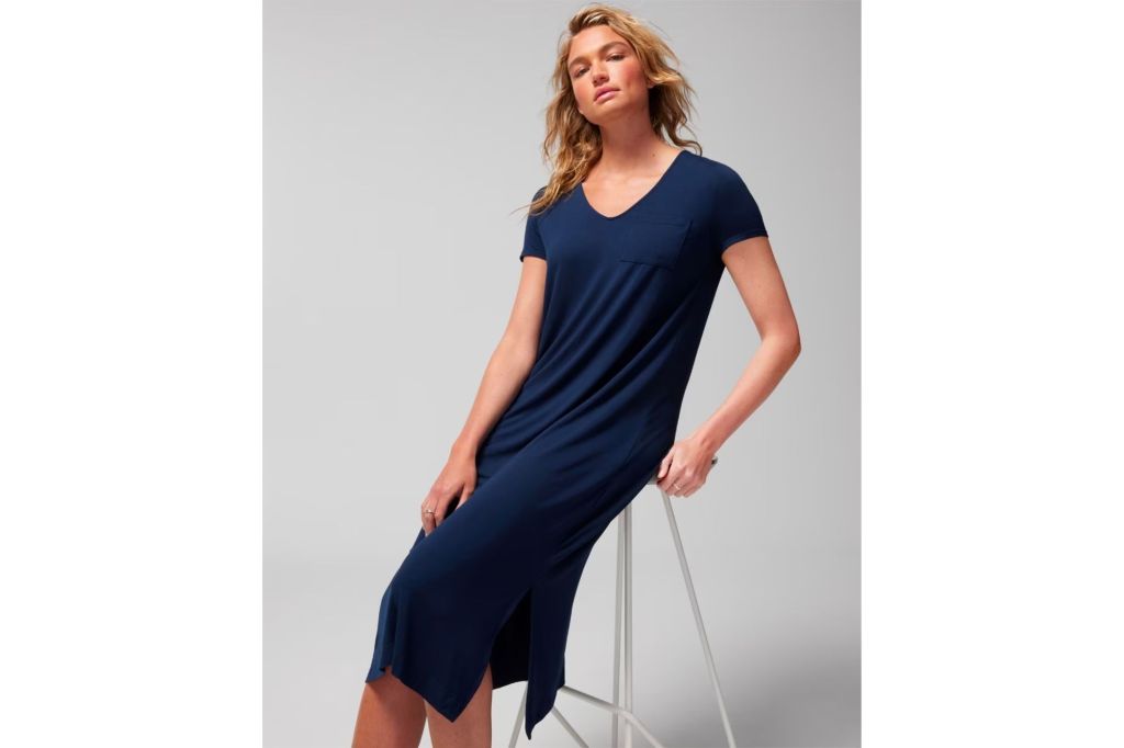 Woman in dark blue sleepshirt.