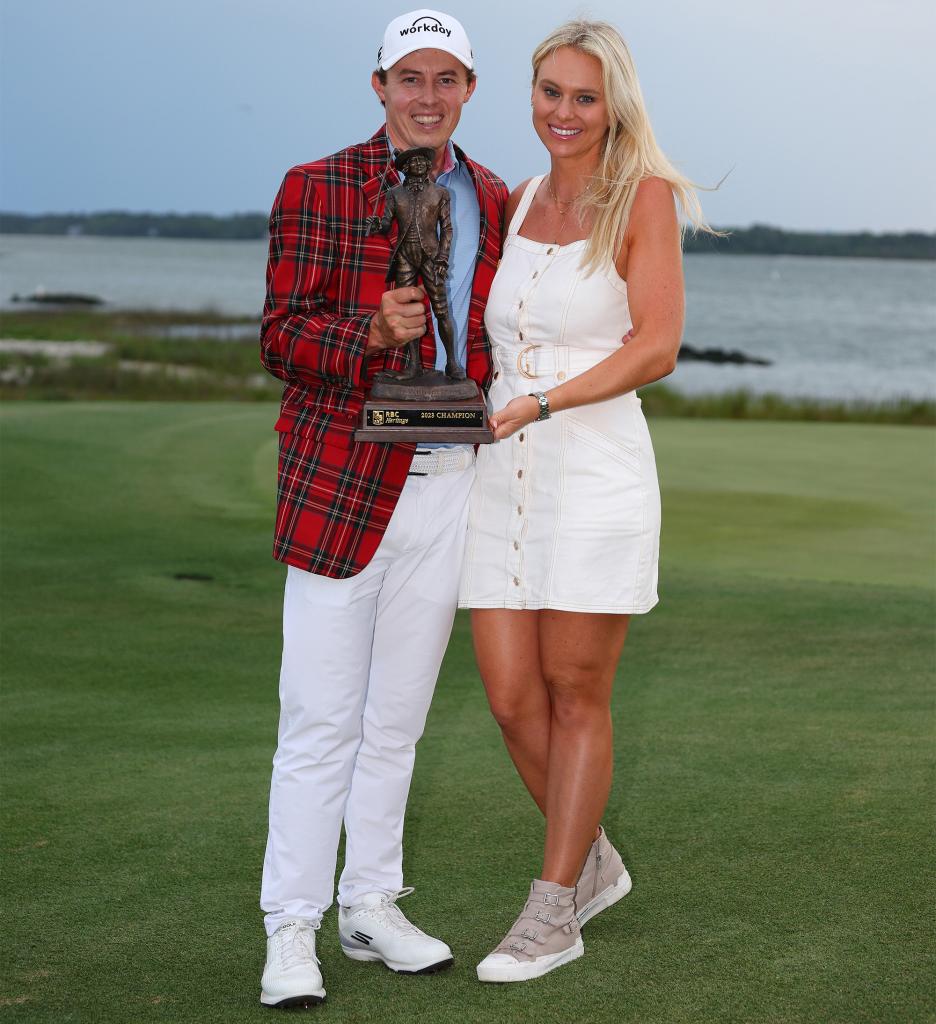 Matt Fitzpatrick celebrates his RBC Heritage win with girlfriend Katherine Gaal on April 16, 2023.