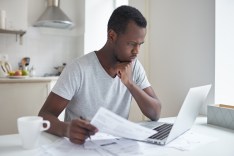 Man reviews student loan refinancing options