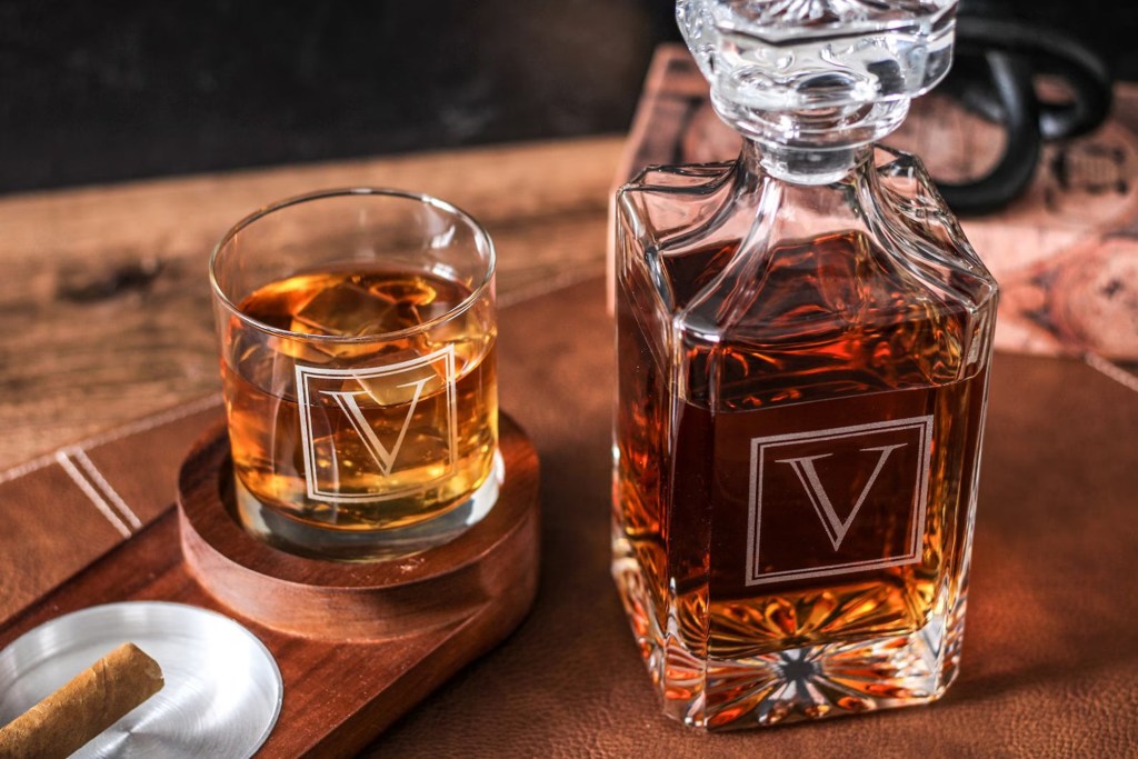 whiskey decanter with "V" engraved onto it
