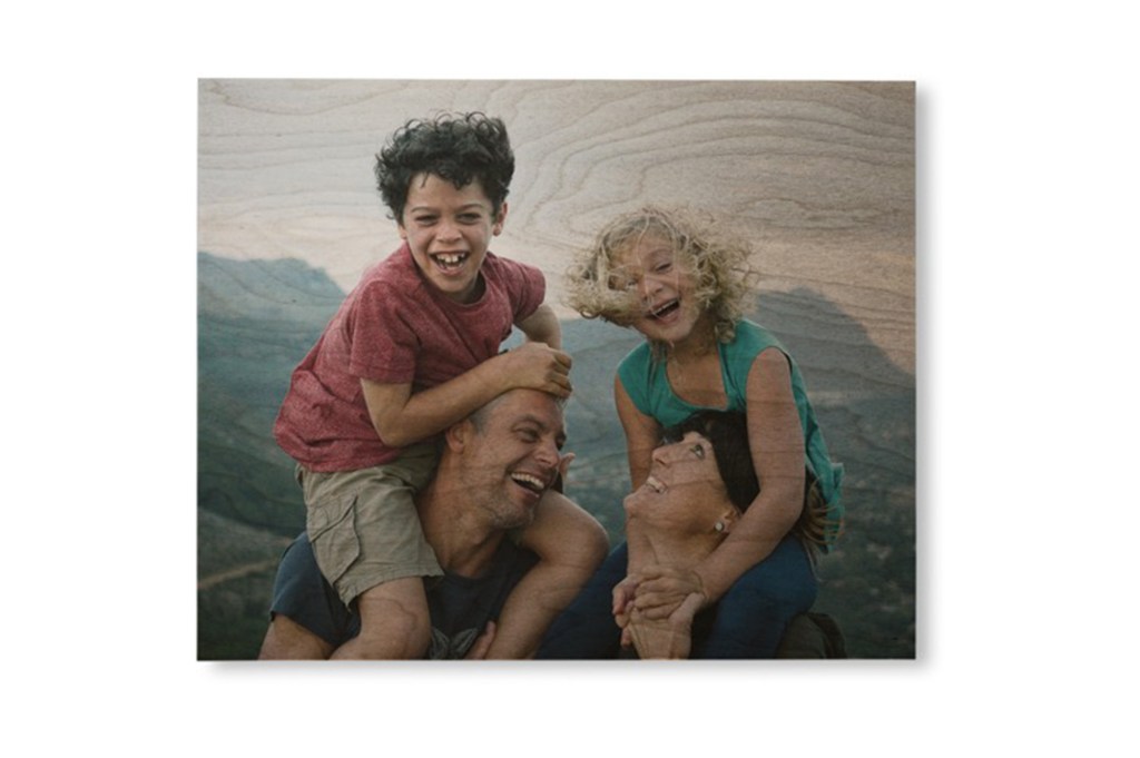 family photo on a wooden frame