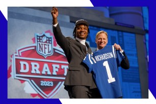 Anthony Richardson (L) poses with NFL commissioner Roger Goodell on draft day.