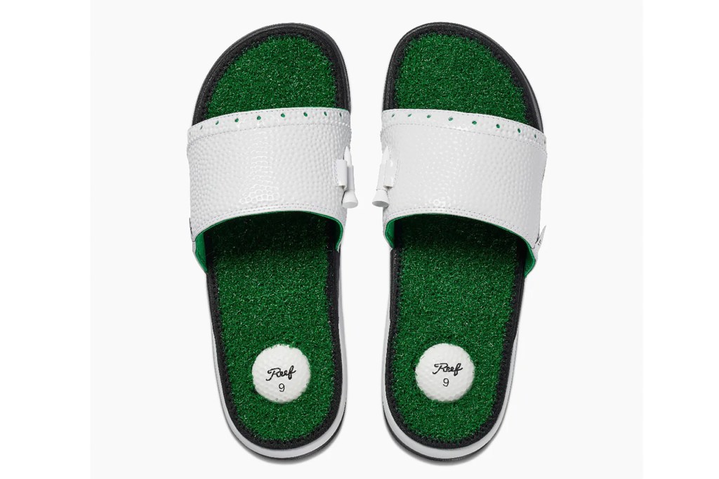 A pair of slides with turf 
