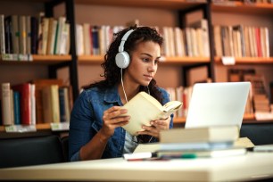 A college student researches student loan requirements.