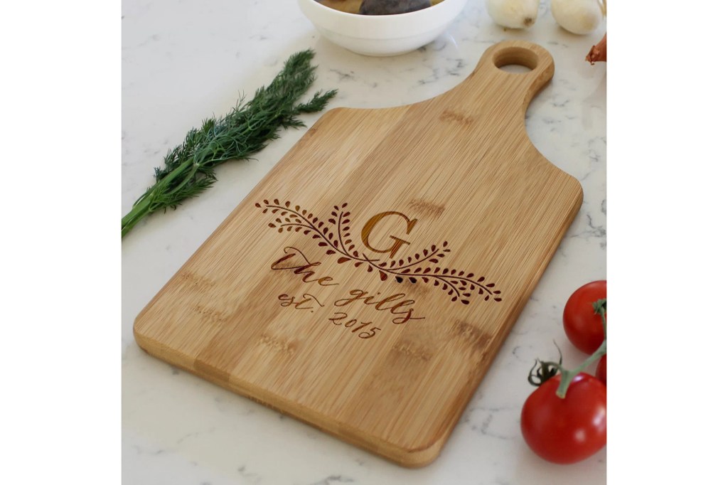 paddle cutting board with engraved initials