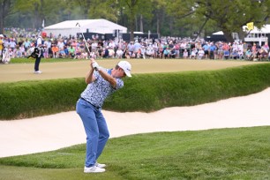 Justin Rose, who is at 1-under-par, plays the third shot on the sixth hole during the second round of the PGA Championship.