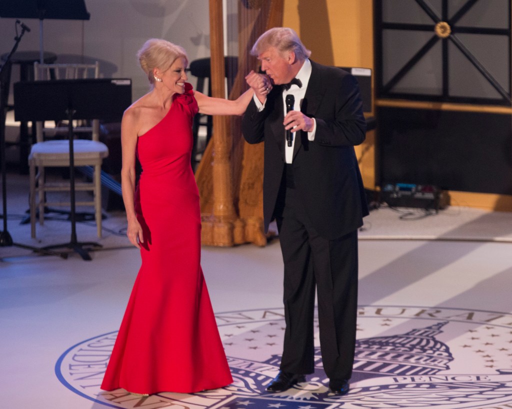 President-elect Donald J. Trump kisses the hand of campaign manager Kellyanne Conway at the Indiana Society Ball to thank donors January 19, 2017 in Washington, DC.