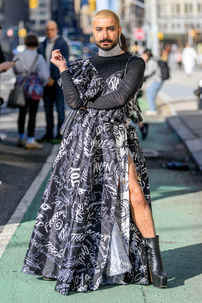 Deni Todorovic wears a graffiti black and white patterned dress at Spring Studios during New York Fashion Week February 2023 on February 15, 2023 in New York City. 