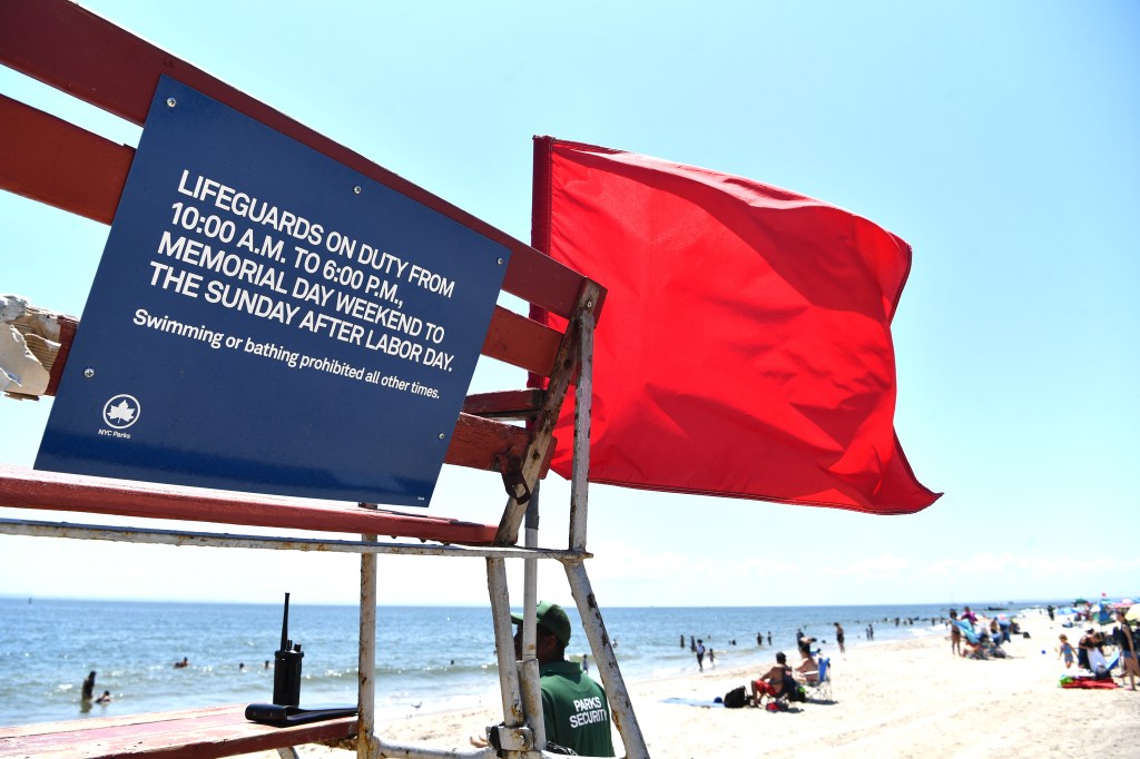 An empty lifeguard chair. 