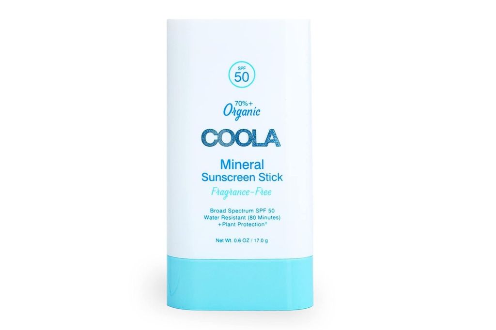 A stick of mineral sunscreen from the brand COOLA.