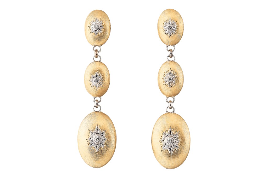 Close up of Buccellati Macri Classica earrings in 18-k yellow and white gold with diamonds